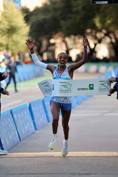 Fentaye Belayneh winning the 2026 Houston Half Marathon in 1:04:49, narrowly edging Tsigie Gebreselama.