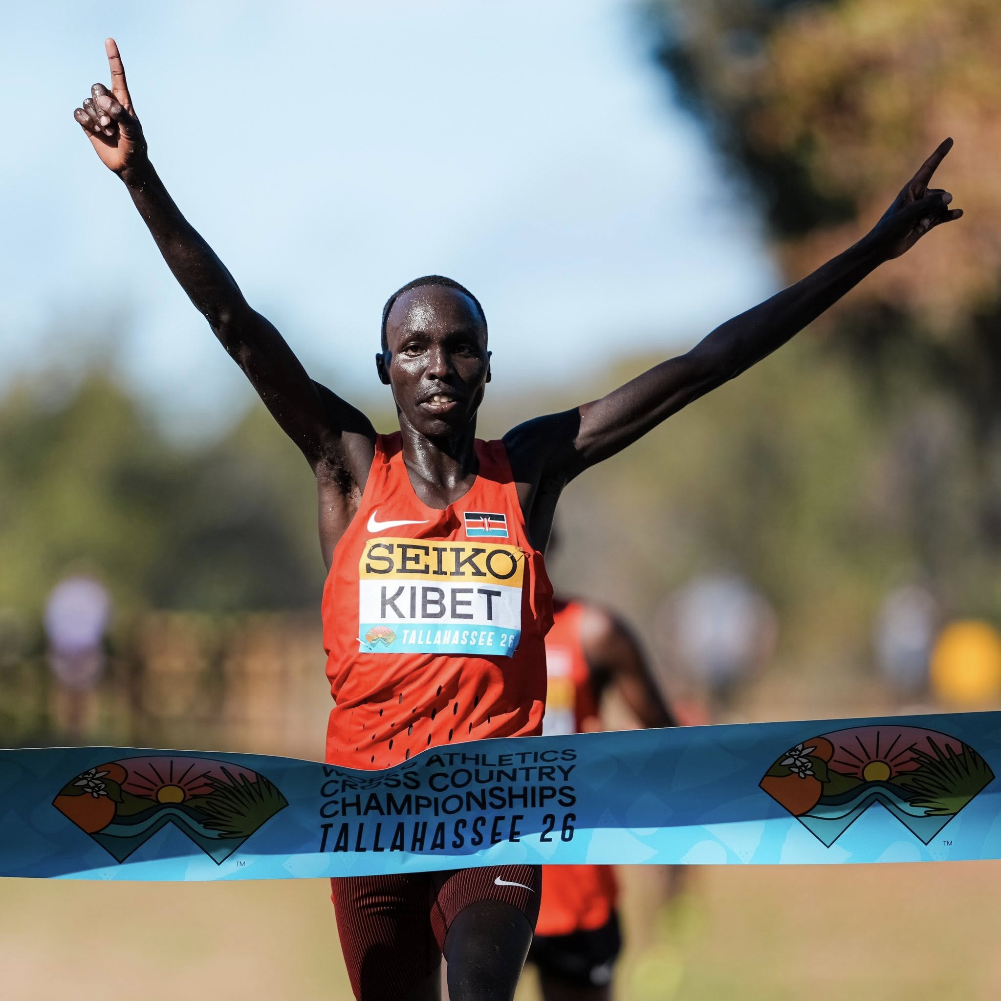 Frankline Kibet celebrating as he crosses the finish line at the 46th World Athletics Cross Country Championships, leading a Kenyan clean sweep in the junior men’s race.