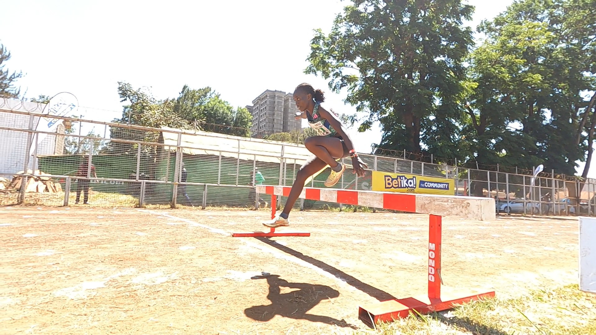 Tecla Cheserek jumping over a barrier during the women’s 3000m steeplechase at Thika Stadium