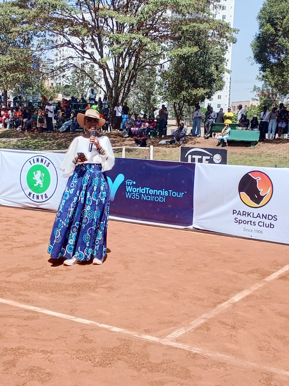 Wanjiru Mbugua, Tennis Kenya President, speaks to spectators at the ITF W35 Nairobi tournament finale at Parklands Sports Club.