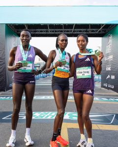 Irene Cheptai, Daisilah Jerono and Ftaw Zeray posing together after finishing first, second and third at the 2026 Burj2Burj Half Marathon in Dubai